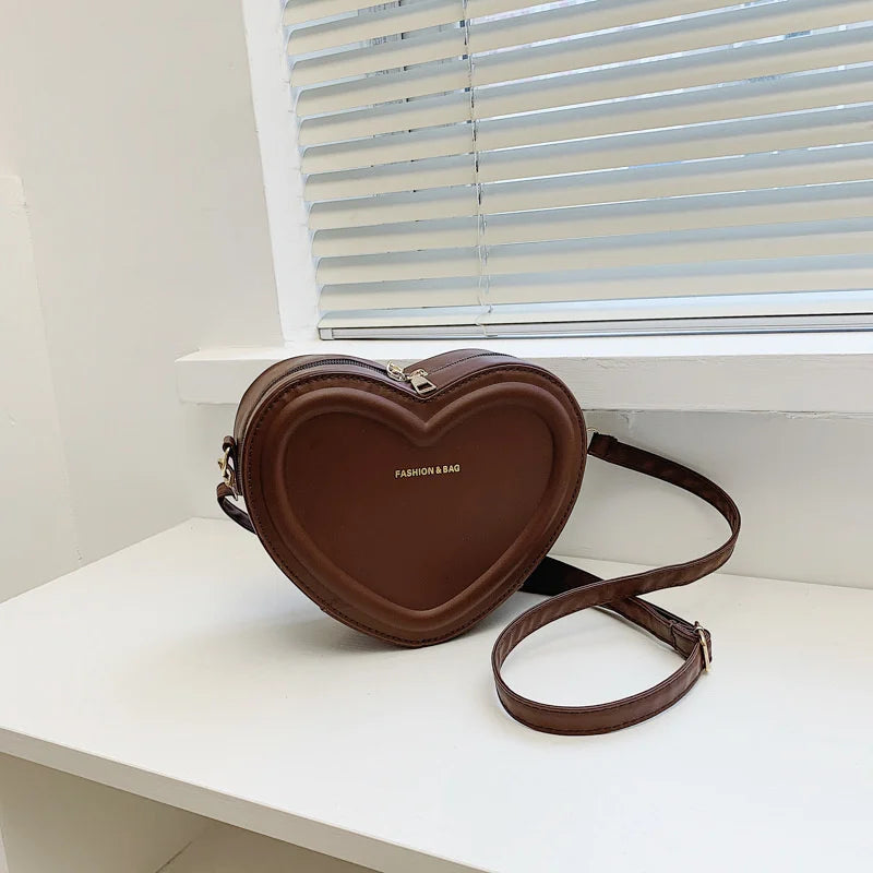 Bolso cruzado en forma de corazón