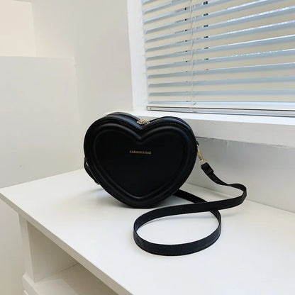 Bolso cruzado en forma de corazón