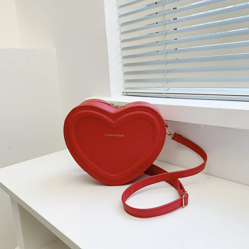 Bolso cruzado en forma de corazón